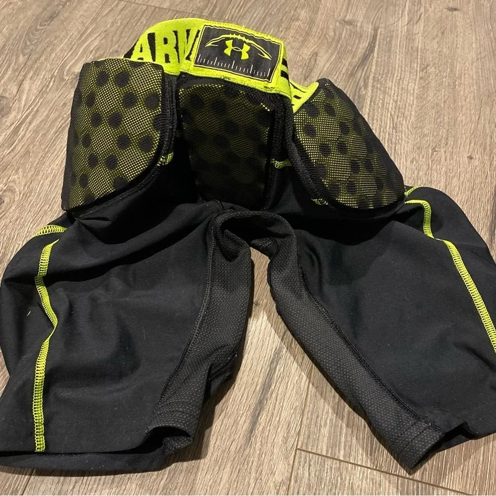 Under Armour Football padded girdle size Youth medium gameday EUC black green UA
